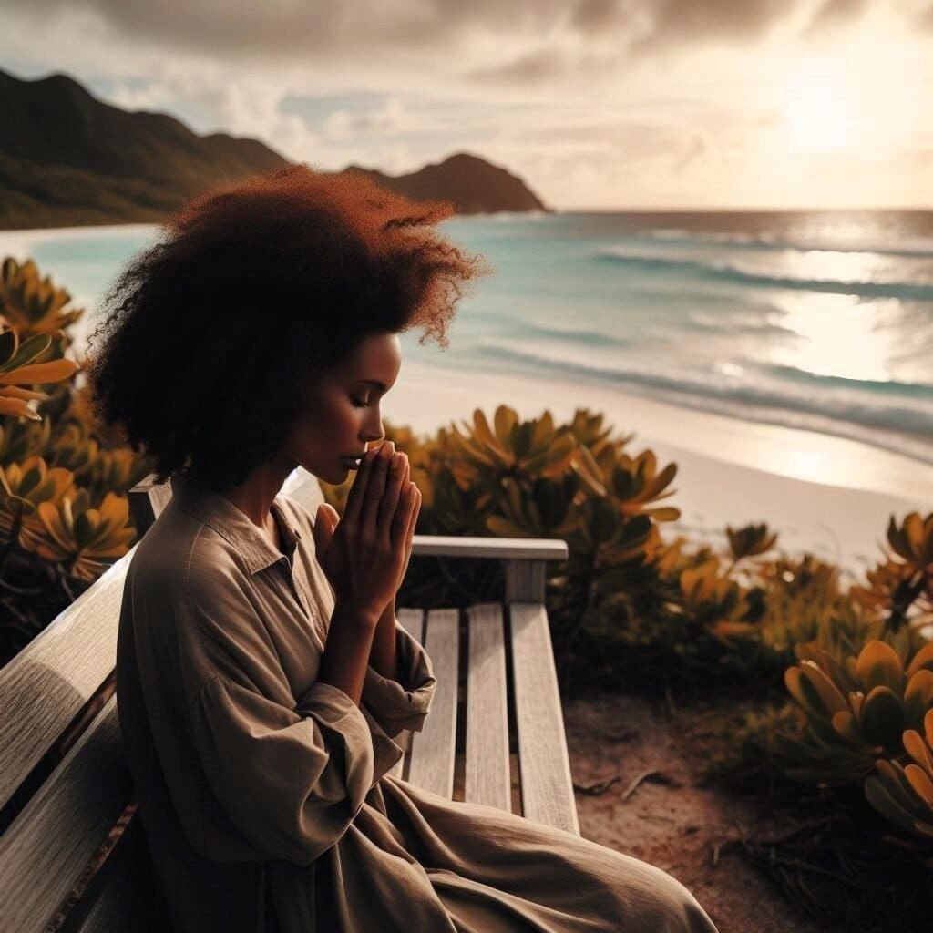 Girl praying by a beautiful lake