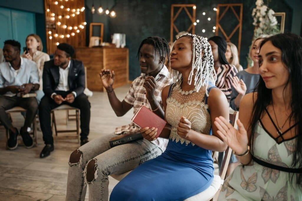 friends praying and worshipping Jesus together